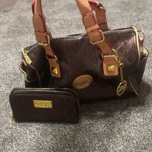 Micheal Kors faux bag medium size. Barely used